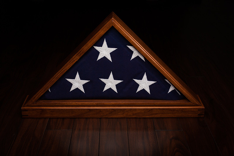 photograph of a Flag in a Memorial Display Case