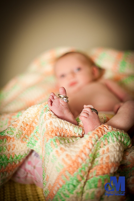 baby with rings on toes