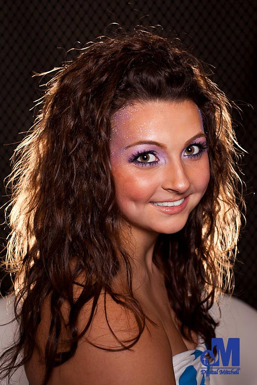 head photo of Madison with shoulder
