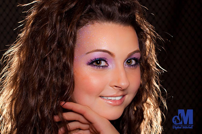 head photo of Madison with hand