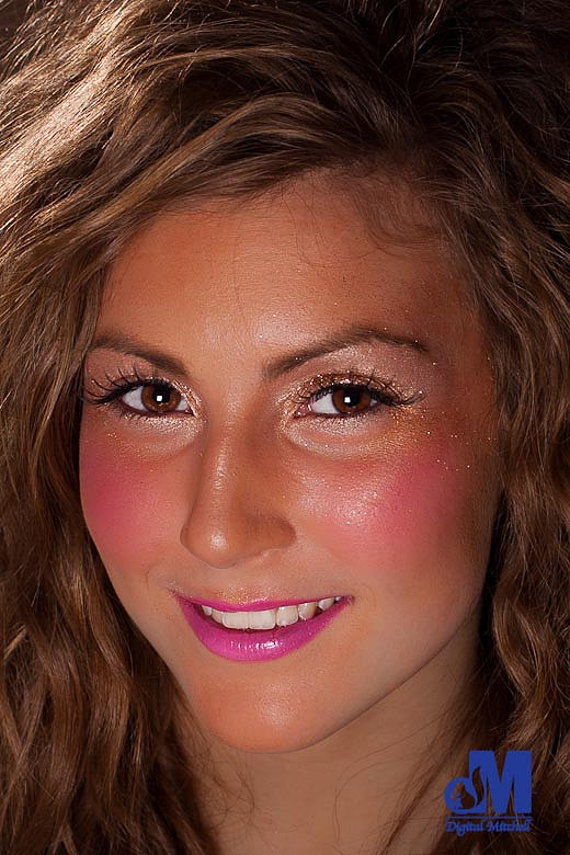 head shot of Emily with purple lips