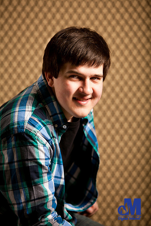 photograph of boy in plaid shirt