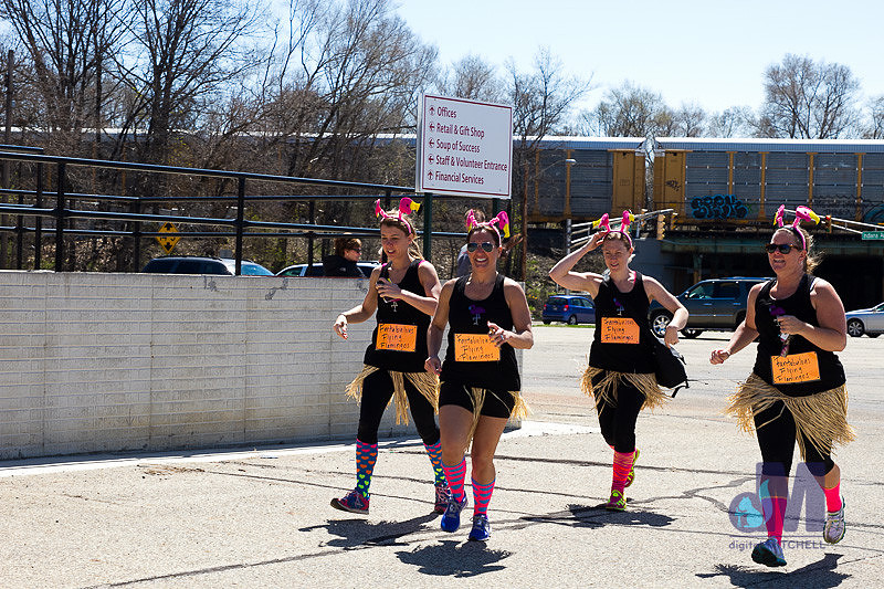 picture of the girls running over finish line at the Elkhart Amazing Race 2014