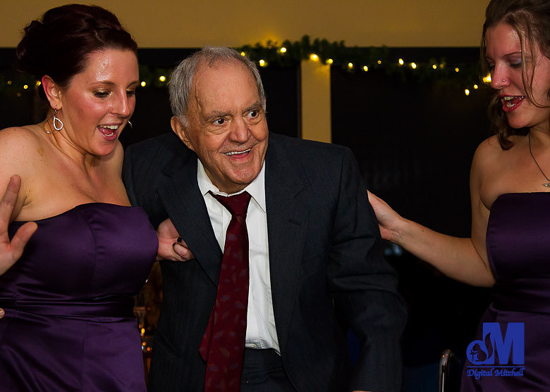 Photograph of Grandfather and bridesmaids at wedding