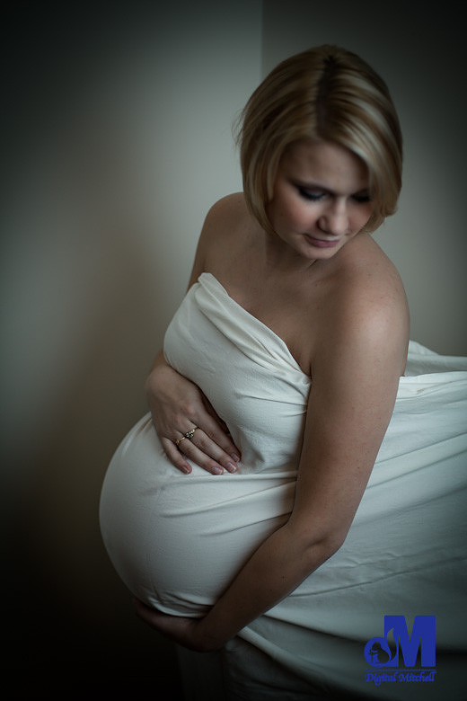 Photograph of maternity with mother in white sheet