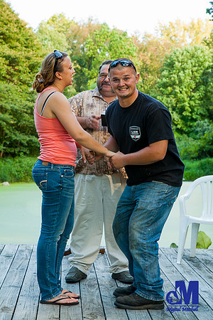 Photograph of groom practicing getting ring