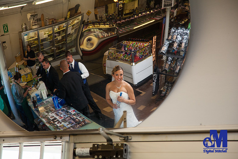 Photograph of wedding party at liquor store