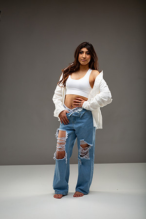 11-Natalie White Shirt Ripped Jeans