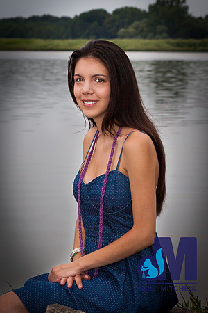 senior photograph of young girl and lake