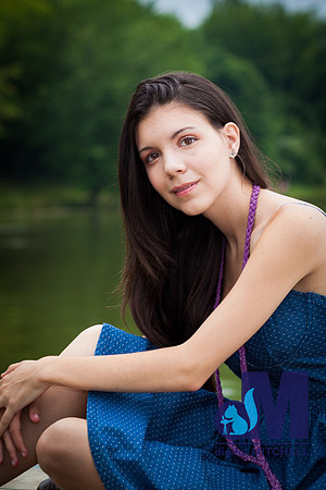 senior photograph of young girl and lake