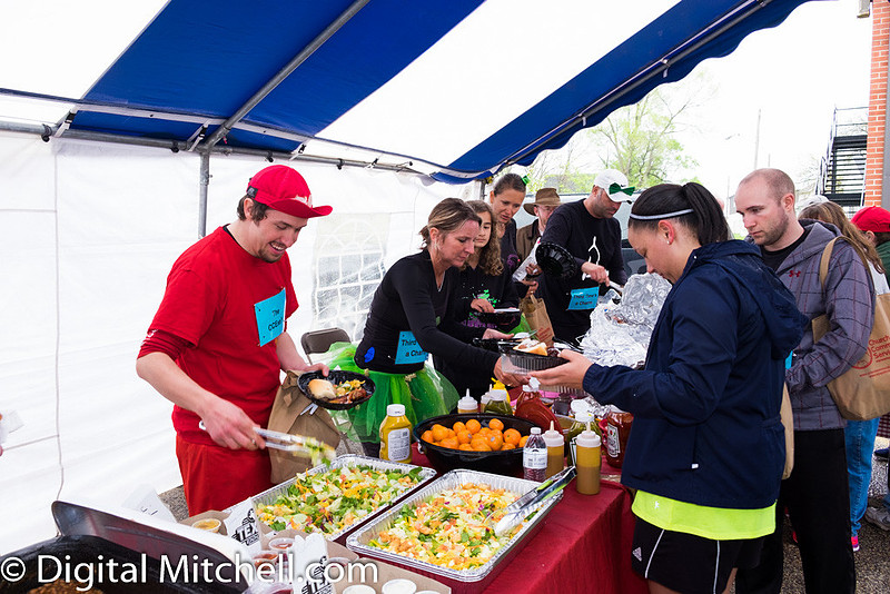 photograph of racers eating