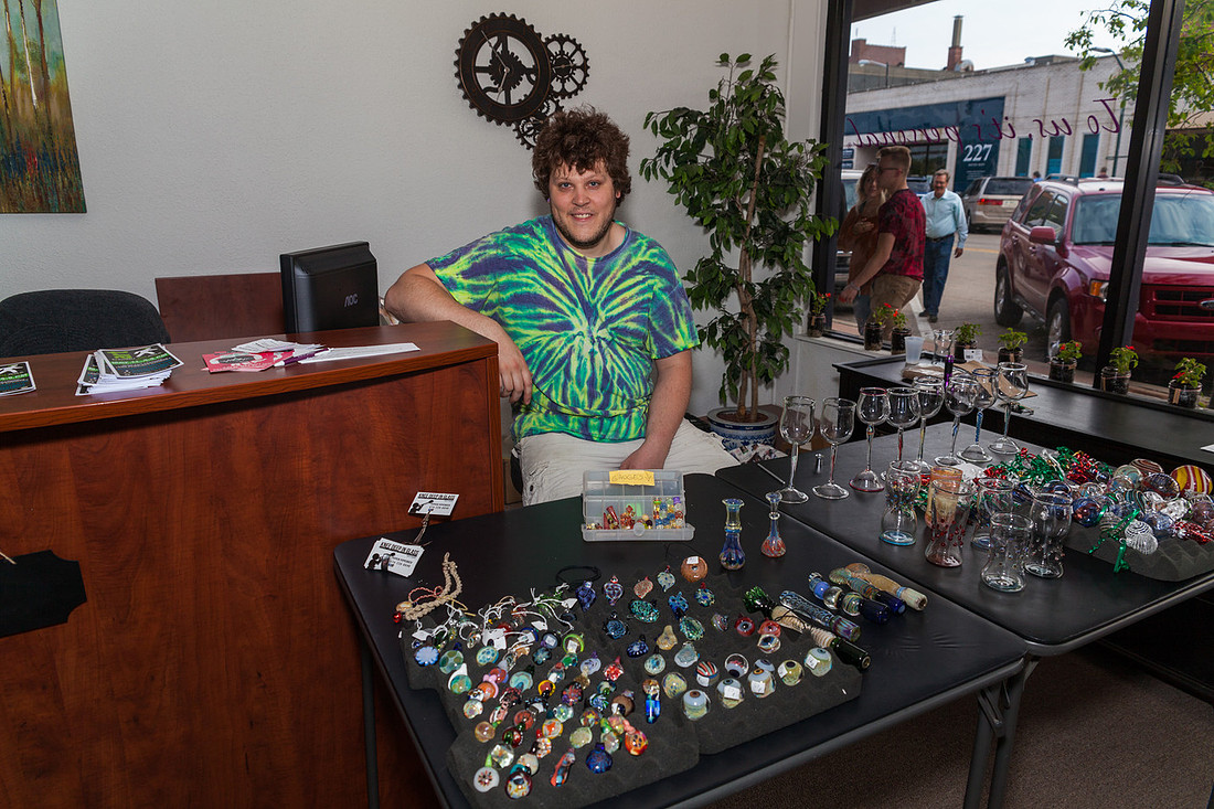 picture of artist with his glassware 