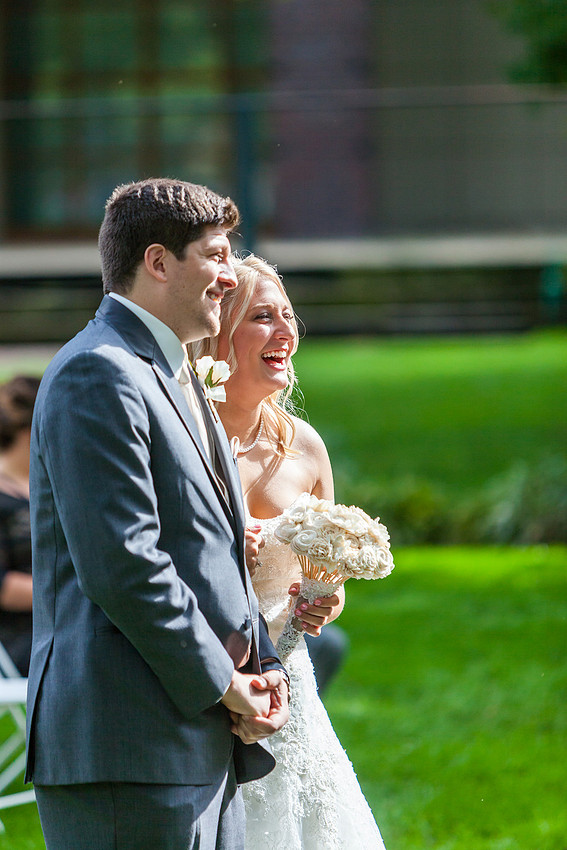 photograph of laughing bride and groom