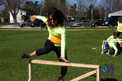 picture of girl jumping at Elkhart Amazing Race 2014