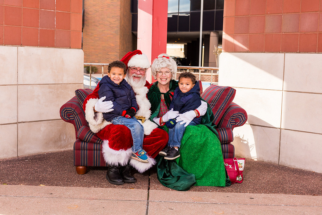 picture of Santa and Mrs. Claus holding twins