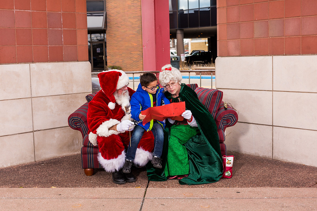 picture of little boy with his list for Santa