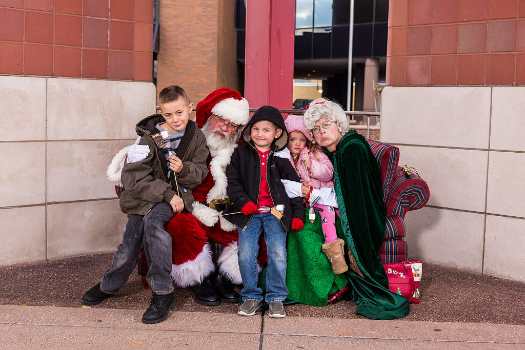 picture of two brothers and one sister on Santa's lap