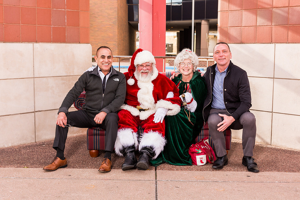 picture of adults with Santa