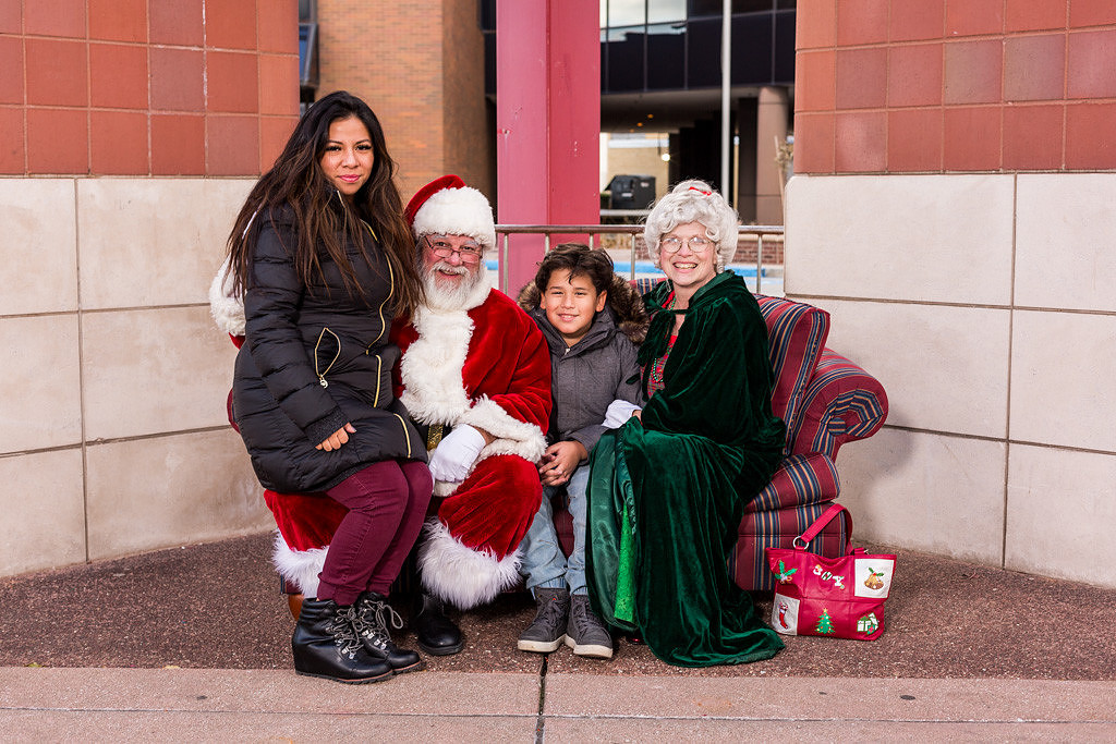 picture of mom and son with Santa