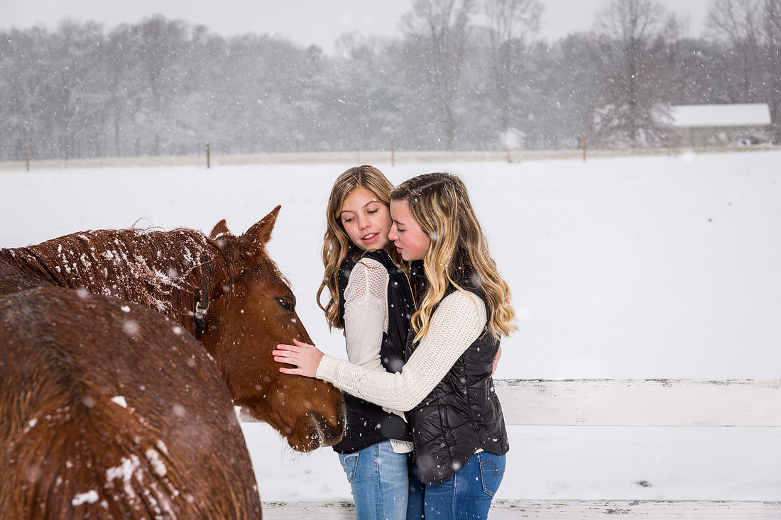 picture of the girls scared by a horse
