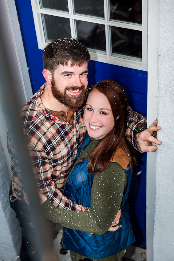 photograph of engagement couple in a doorway
