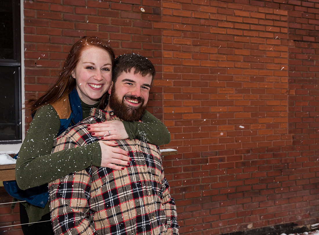 picture of a girl hugging her fiance 