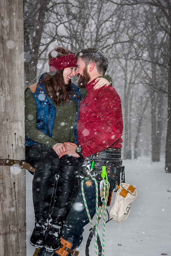 image of couple holding each other in the snow