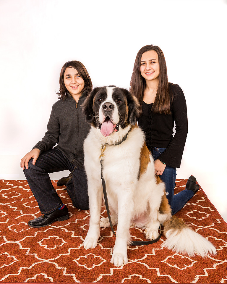 two kids and their dog