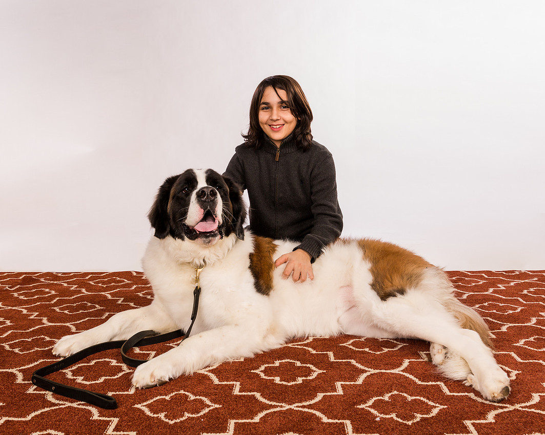 portrait of The son and his dog