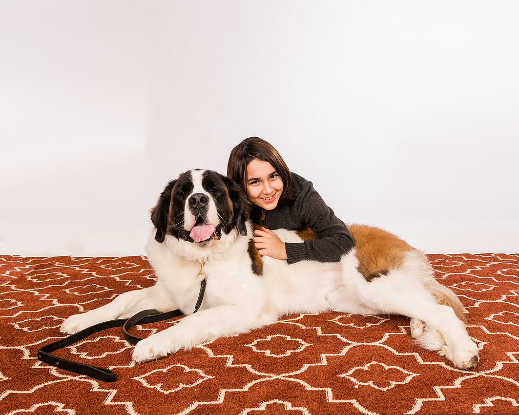 picture of The son hugging his dog