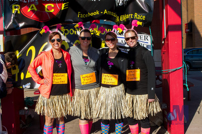 Racers in hula skirts