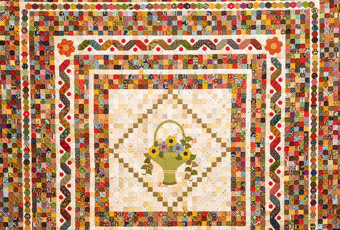 Image of a large hand made quilt