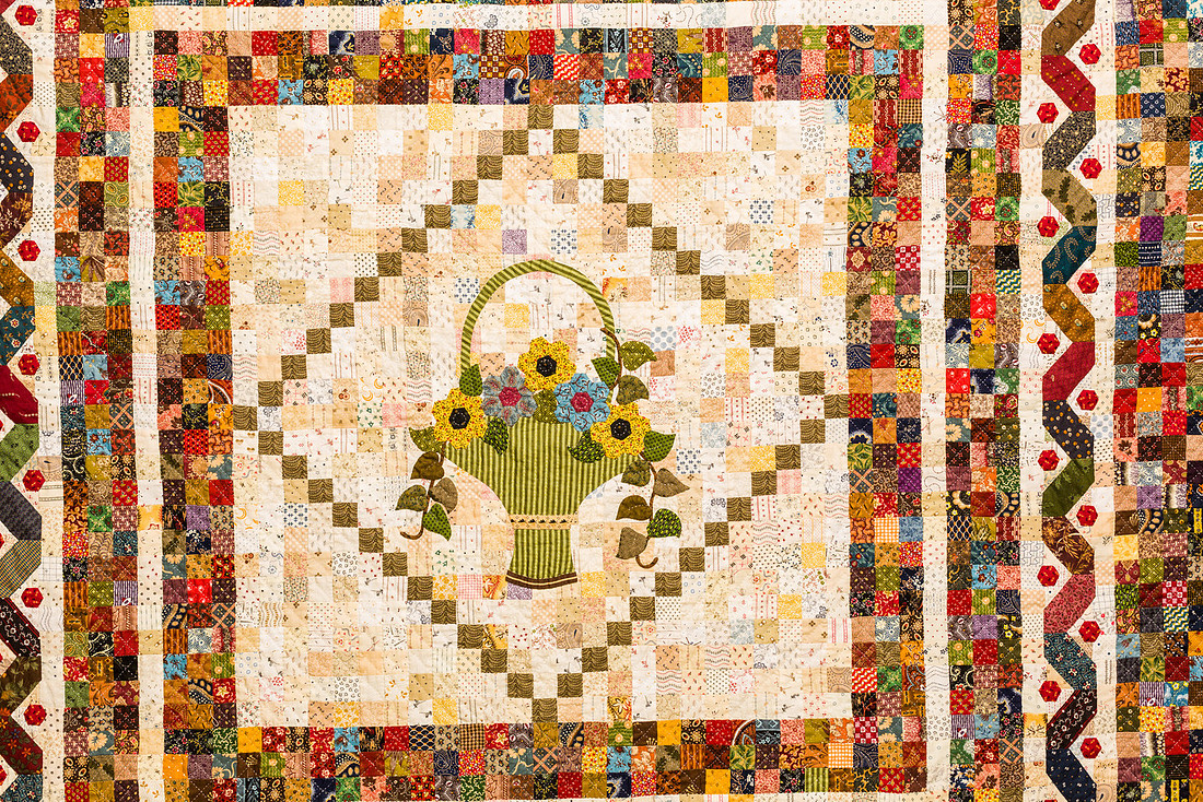 Image of a large hand made quilt