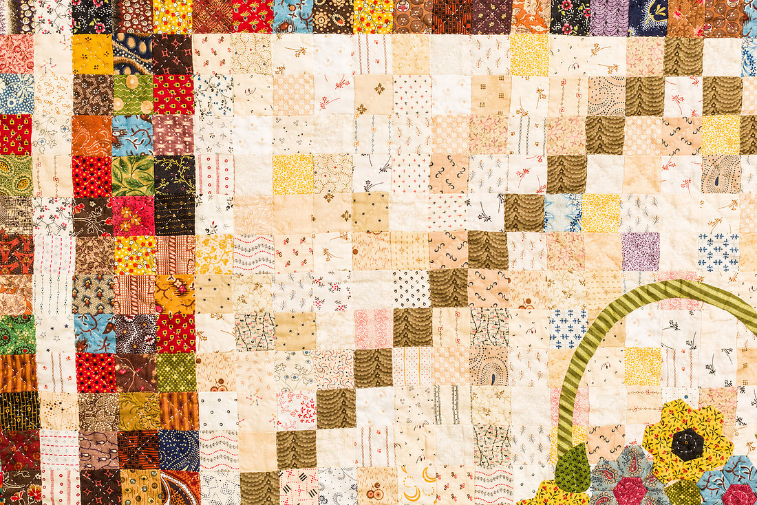 Image of a large hand made quilt
