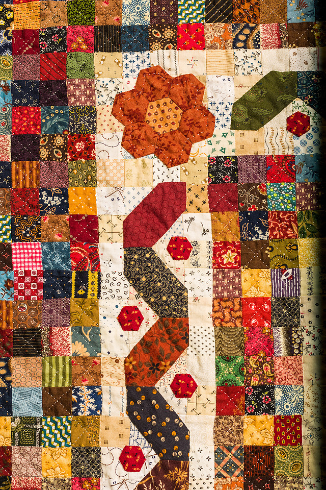 Image of a large hand made quilt