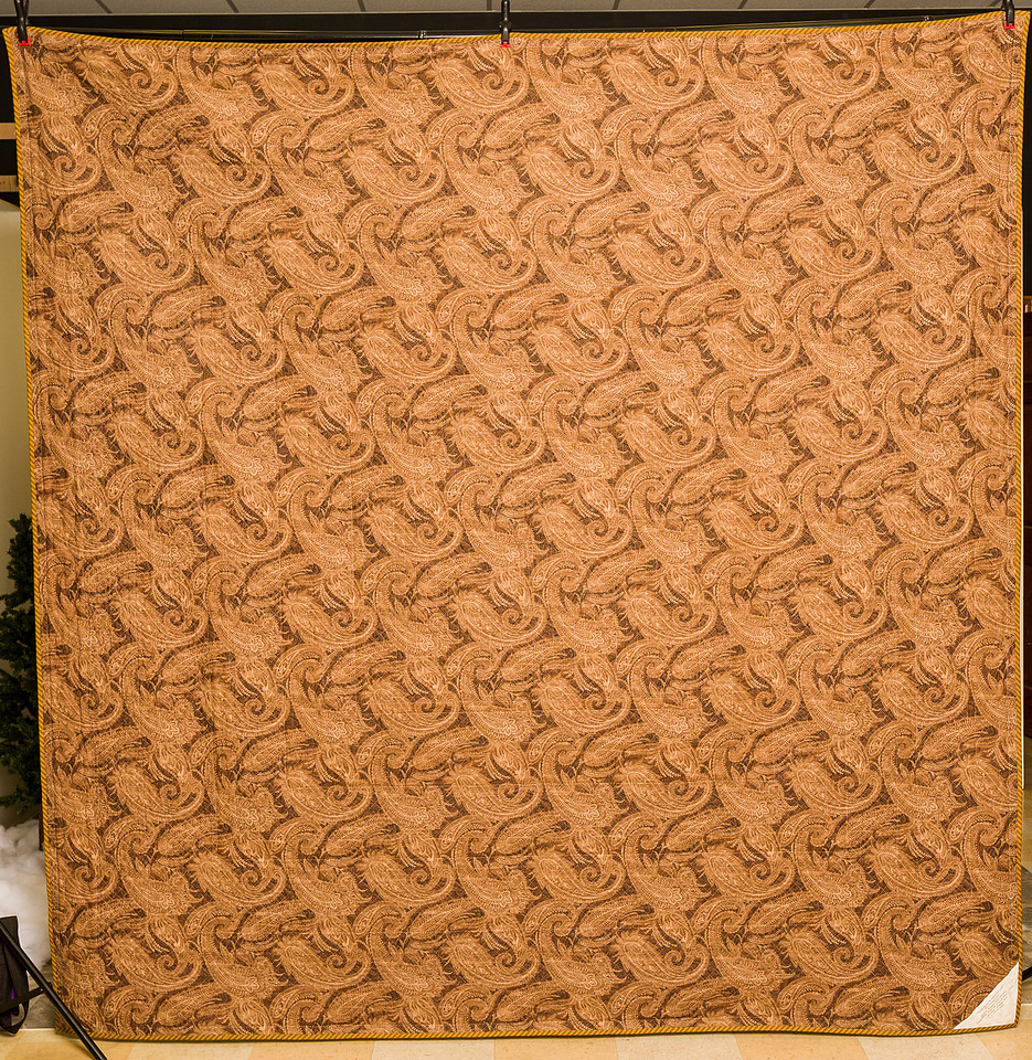 Image of a large hand made quilt