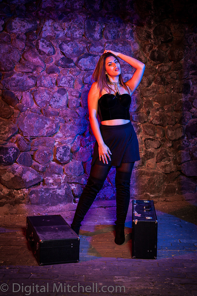 Image of young lady in black over the knee boots 