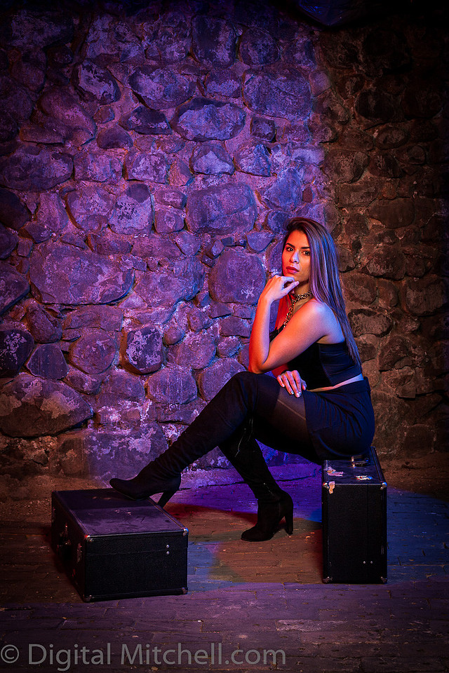 Image of young lady in black over the knee boots 