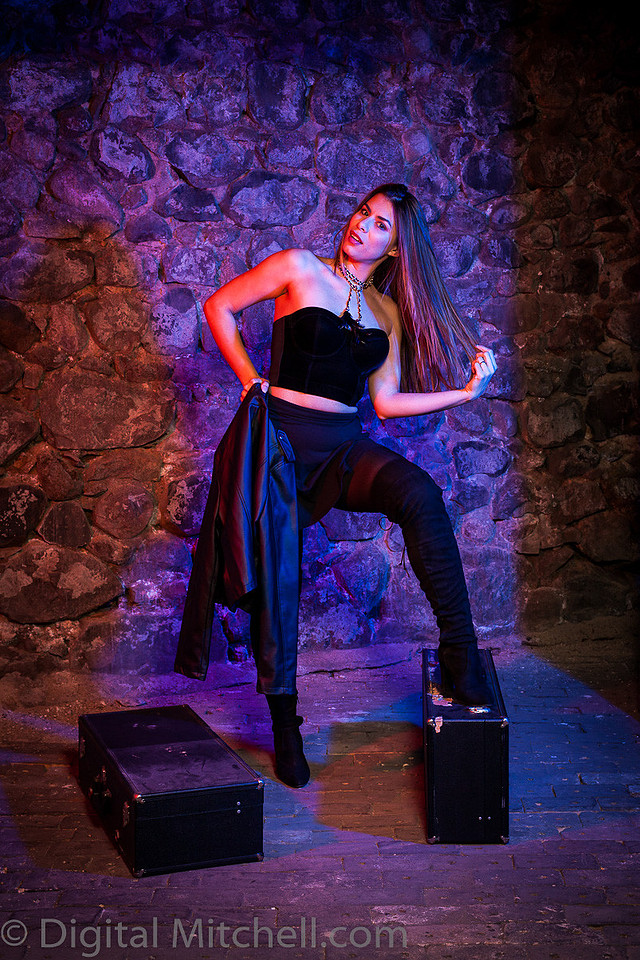 Image of young lady in black over the knee boots 