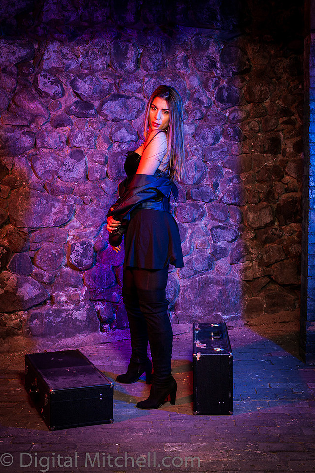 Image of young lady in black over the knee boots 