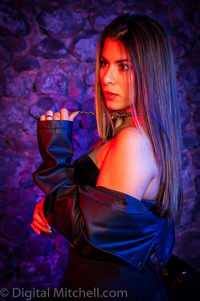 Image of young lady in black over the knee boots 