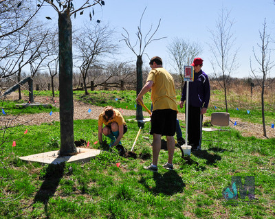 picture of planting tree at Elkhart Amazing Race 2014