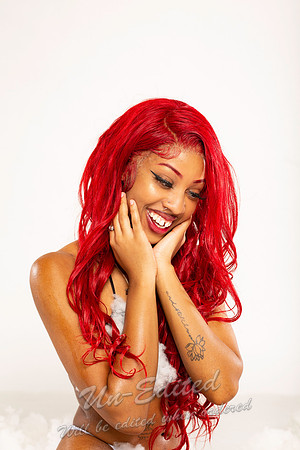 56-Nicole in snow with red hair